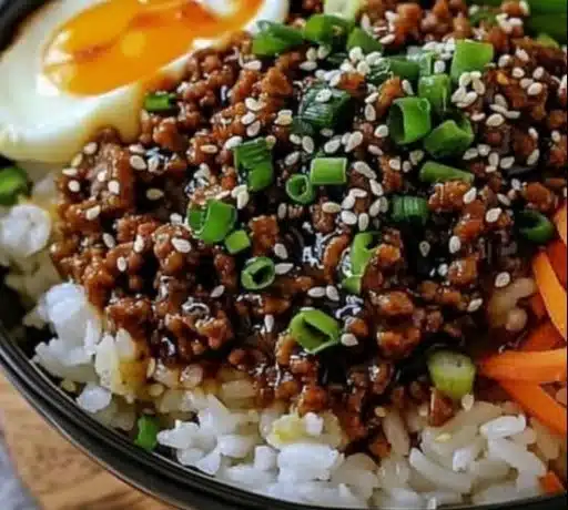 Delicious Korean Ground Beef Bowl topped with vegetables and rice