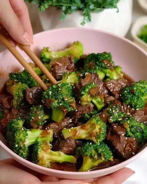 Delicious Beef Broccoli Stir-Fry served in a bowl with fresh broccoli and juicy beef.