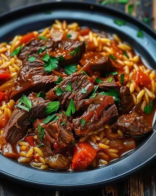 Delicious Beef Giouvetsi with tender beef and rich pasta in a traditional Greek dish