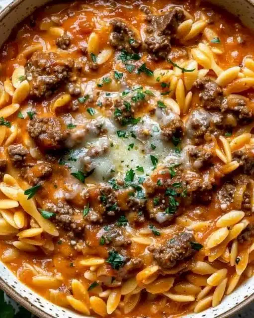 Delicious Beef Orzo with Tomato Cream Sauce served in a bowl
