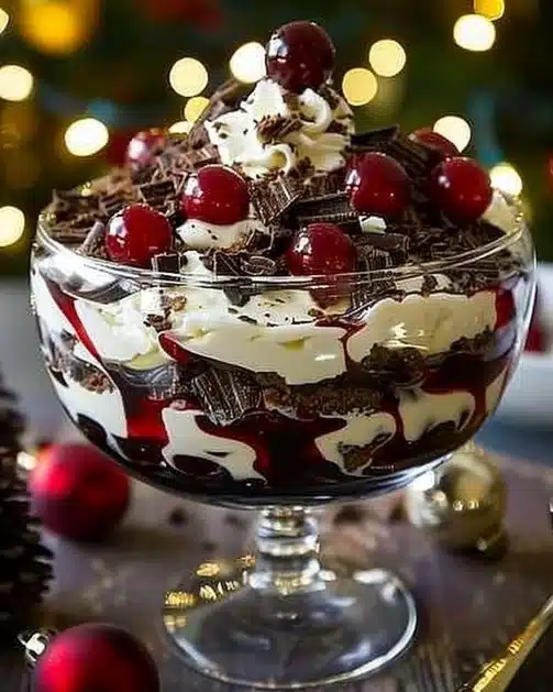Delicious Black Forest Trifle with layers of chocolate, cherries, and whipped cream
