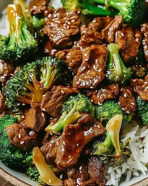 Delicious Chinese Beef and Broccoli stir-fry dish served with rice