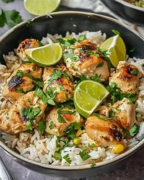 Delicious Coconut Chicken served with rice in a vibrant dish.