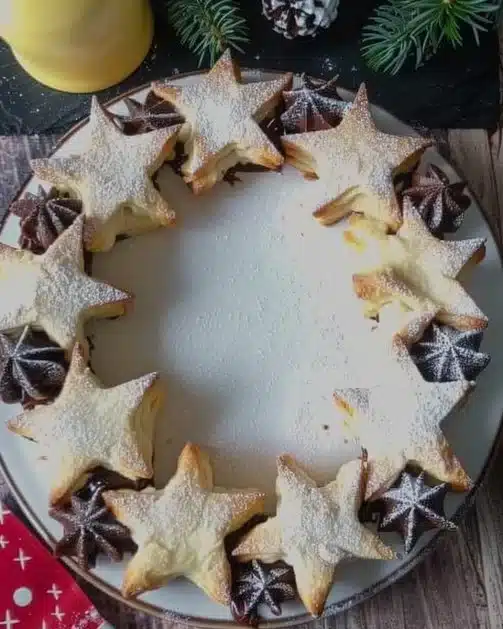 Nutella puff pastry star wreath dessert decorated for festive occasions
