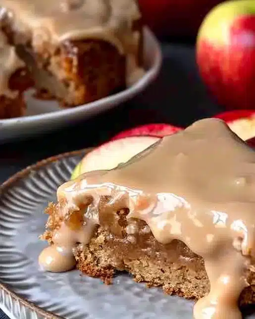 Delicious homemade Apple Spice Cake topped with cream cheese frosting.