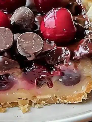 Delicious Cherry Chocolate Chip Pie showcasing rich cherries and chocolate chips