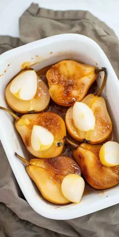 Deliciously baked pears served warm with spices and a drizzle of honey.