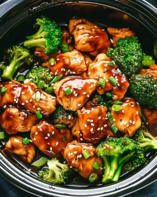 Crockpot Teriyaki Chicken in a bowl with rice and vegetables