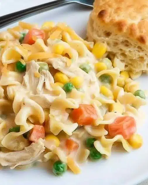 Easy chicken pot pie casserole with flaky crust and hearty filling