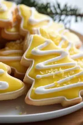 A plate of Lemon Tree Cookies decorated for the holidays.