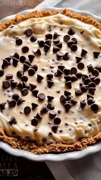 Delicious Chocolate Chip Cannoli Pie with creamy filling and chocolate chips