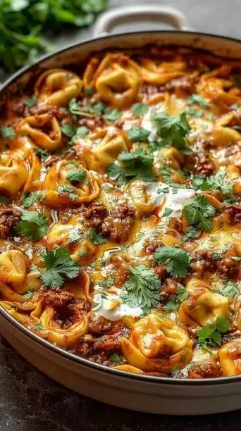Delicious cheesy beef enchilada tortellini served in a bowl