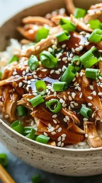 Delicious Crockpot Chicken Teriyaki Bowls served with rice and vegetables.