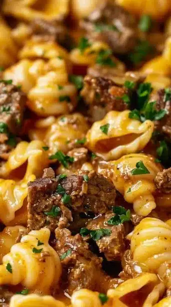 One-pot creamy beef and shells dish served in a bowl